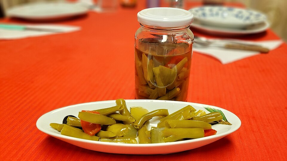 A dish of yellow wax beans cooked with dill and a tangy sauce